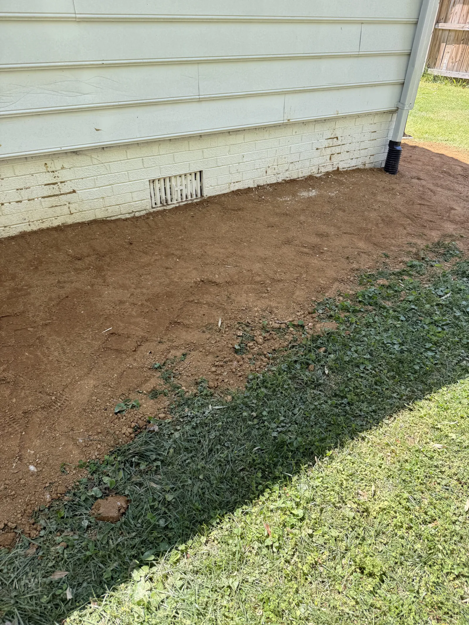 Water Management: Re-Grading and Exterior Drainage